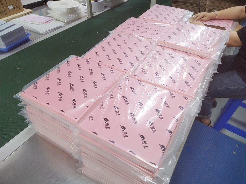 Heat-conducting silicone pad packaging processing